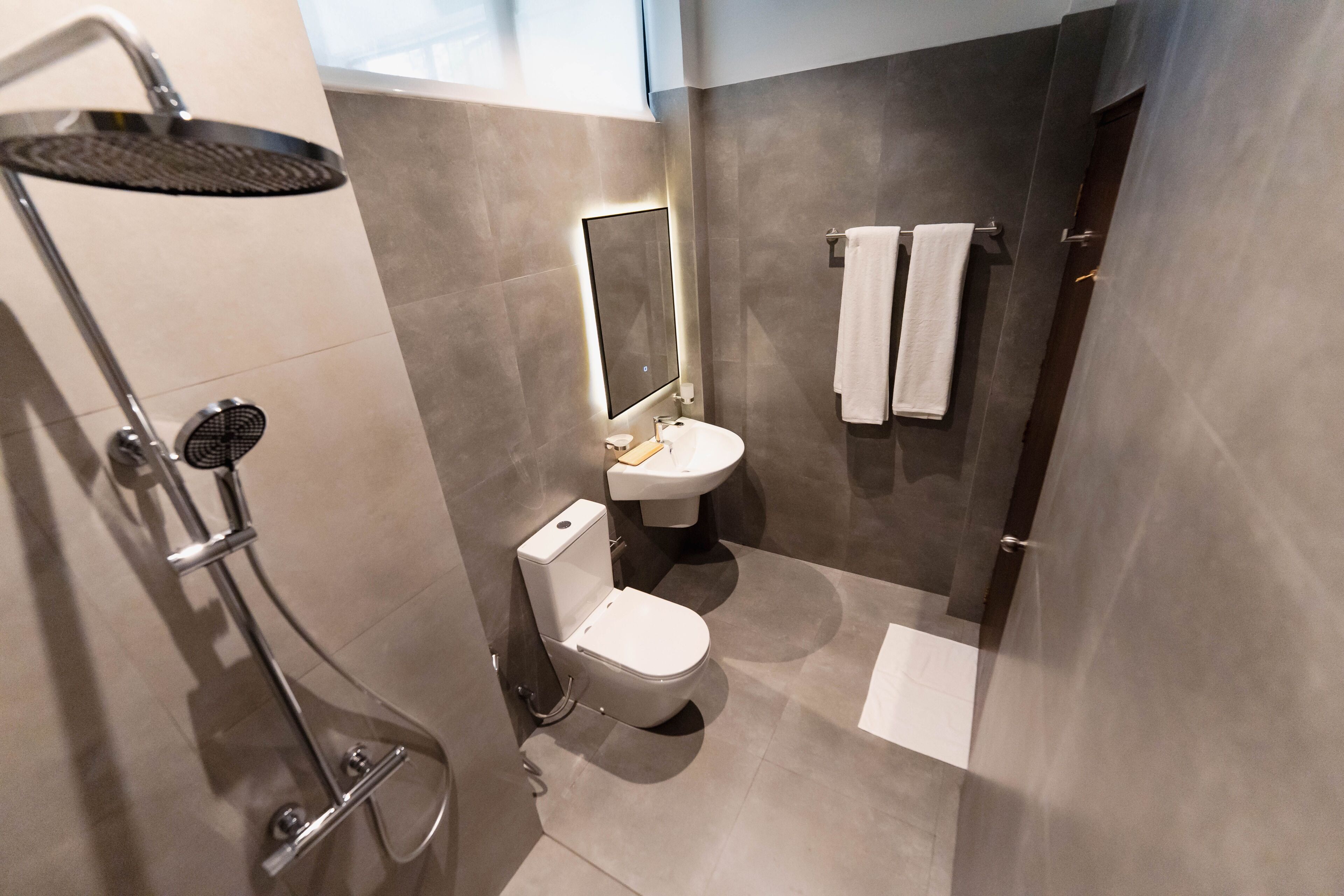 Shower, slippers, towels, soap