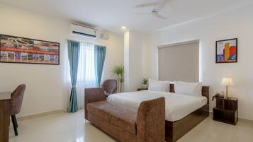 Family Room, City View | Desk, laptop workspace, soundproofing, iron/ironing board