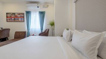 Family Room, City View | Desk, laptop workspace, soundproofing, iron/ironing board