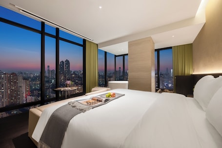 Premier Double Room, City View | Living area | 50-inch flat-screen TV with satellite channels