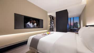 Premium bedding, down duvets, memory-foam beds, desk