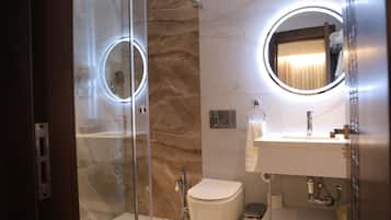 Separate tub and shower, free toiletries, hair dryer, slippers