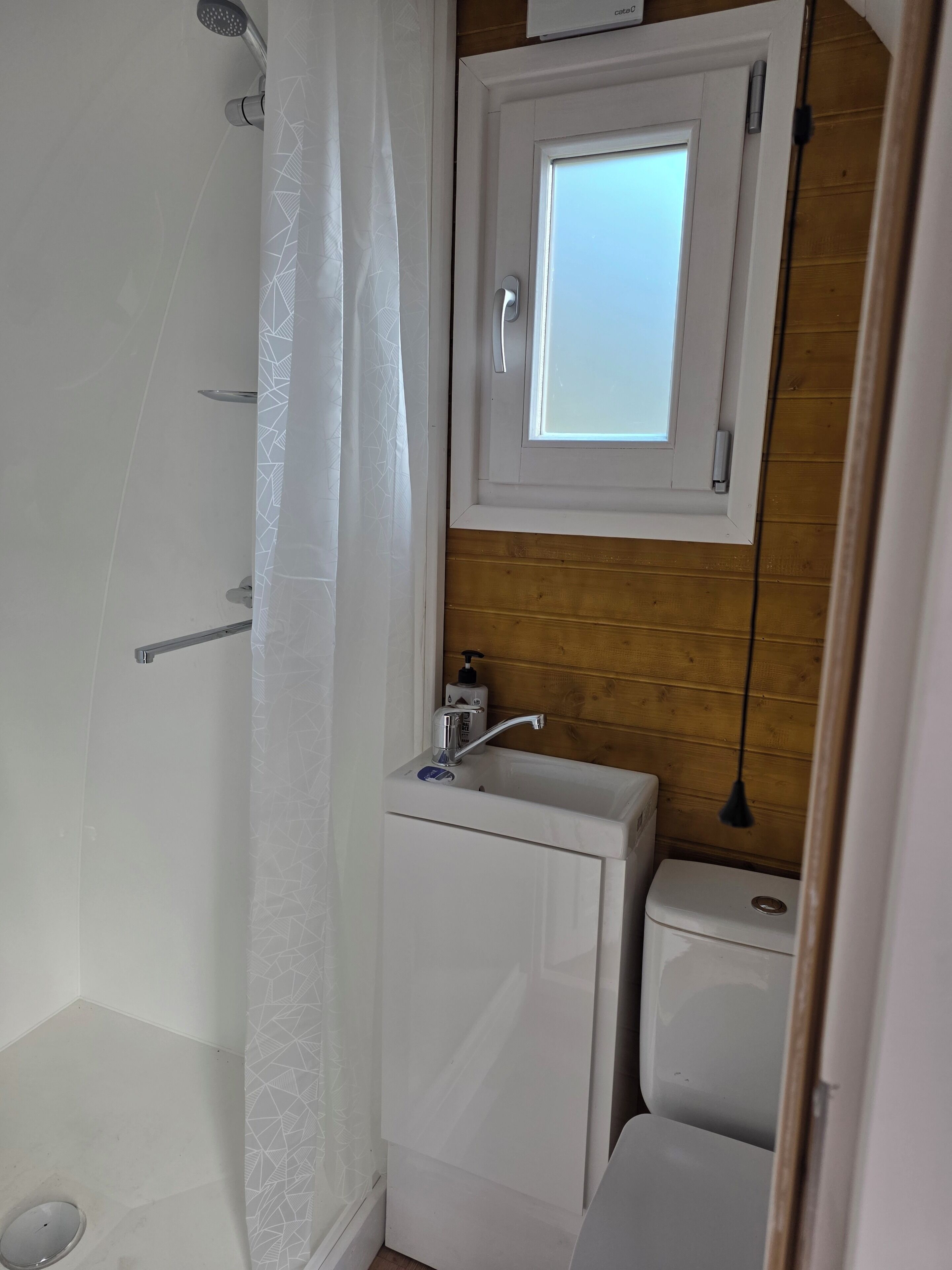 Shower, towels, toilet paper