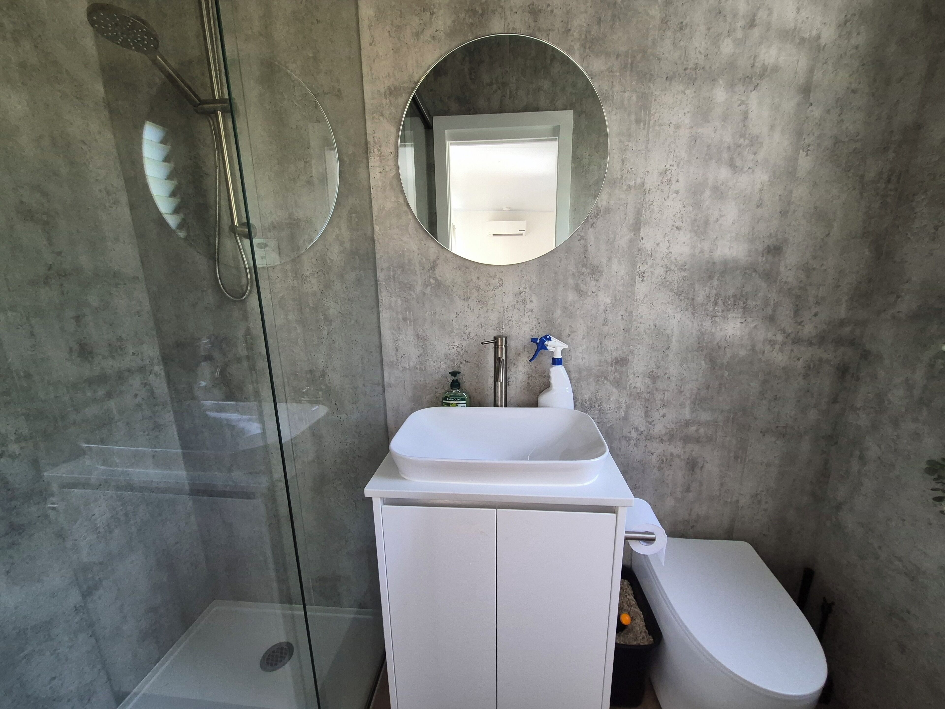 Shower, towels, soap, toilet paper