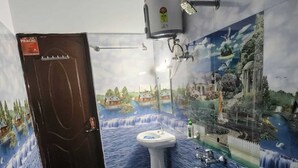 Buồng tắm vòi sen, xà phòng
