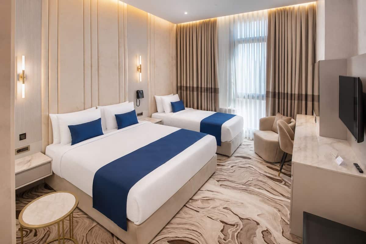 Trendy Room with 1 King + 1 Single | Minibar, free WiFi, bed sheets