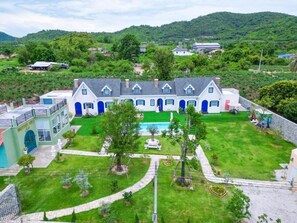 Deluxe Quadruple Room, Balcony, Courtyard View | Exterior - British Hill Resort (Tambon Sattahip)