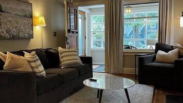 TV, fireplace, books, stereo