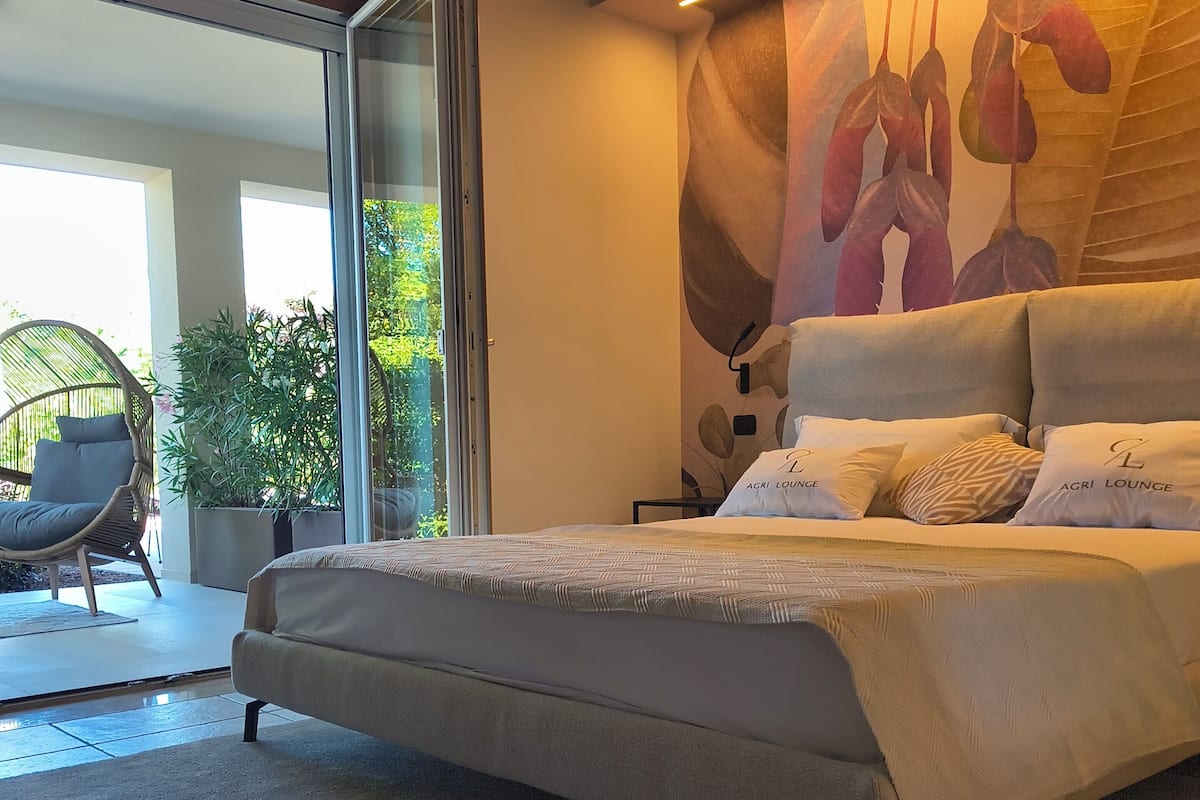 Double Room With Patio | Minibar, caja fuerte, wifi gratis y ropa de cama