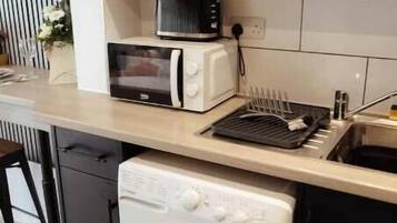 Refrigerador, microondas, horno, placa de cocina