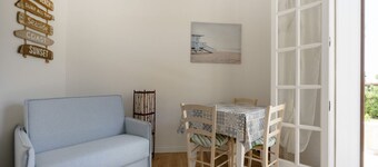 This cozy apartment, perfect for two people, is located in a shared villa but has its own private access. It features a shared garden and a large furnished patio for exclusive use. The accommodation is located in Marina di Pulsano, a well-served seaside 