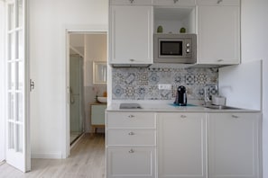 Fridge - Large studio apartment perfect for two people, is located in a shared villa but has its own private access. It features a shared garden and a large furnished patio for exclusive use. The accommodation is located in Marina di Pulsano, a well-served seasid (Marina di Pulsano)