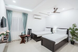 Chambre Deluxe avec lits jumeaux | Bureau, espace de travail pour ordinateur portable, Wi-Fi gratuit