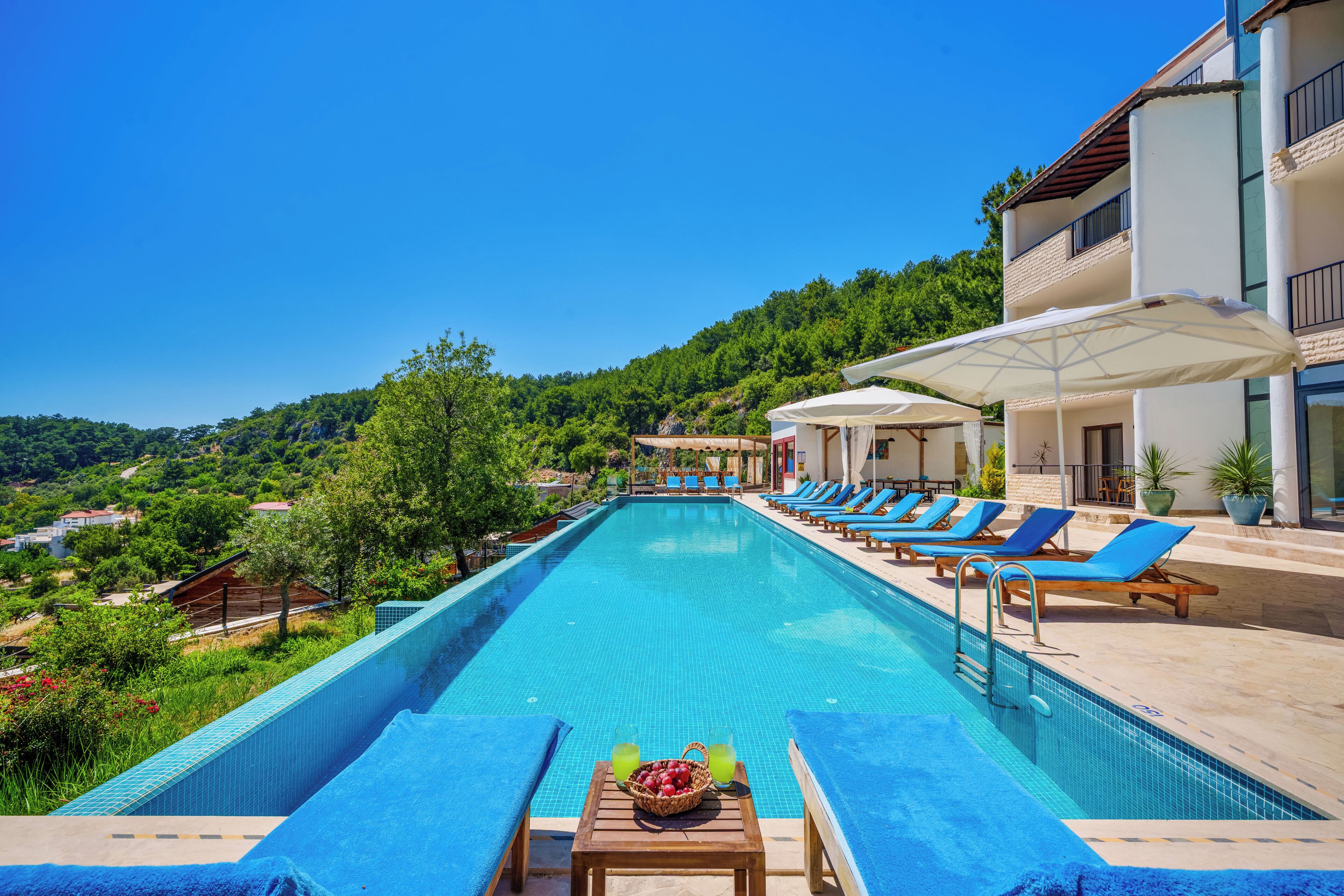 Outdoor pool, open 9:00 AM to 9:00 PM, free pool cabanas, pool umbrellas