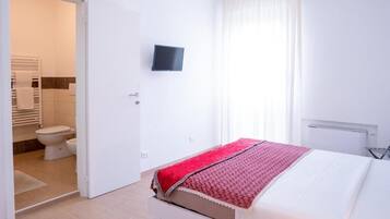 Chambre Triple Deluxe | Fer et planche à repasser, Wi-Fi gratuit