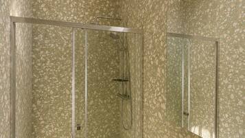 Chambre Double Ville | Salle de bain | Douche, sèche-cheveux, serviettes fournies, savon