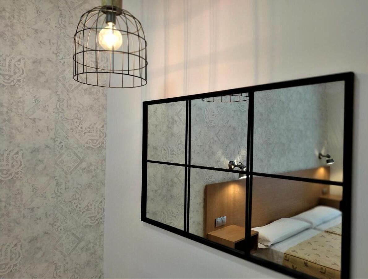 Habitación cuádruple | Edredón, wifi gratis y ropa de cama 