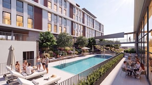 A modern hotel with a rooftop pool, outdoor seating, and a landscaped garden. - SUIO Alcobendas (Alcobendas)