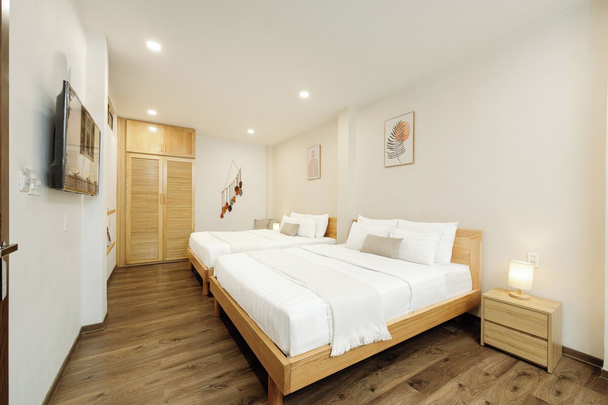 Deluxe Quadruple Room, Kitchenette | Free minibar items, free WiFi, bed sheets