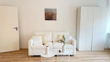 Apartamento, 3 habitaciones | Zona de estar