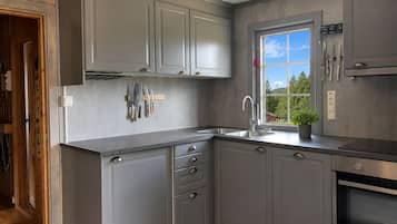 Fridge, oven, coffee/tea maker, cookware/dishes/utensils