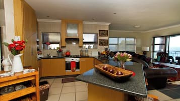 Mini-fridge, microwave, stovetop, coffee/tea maker