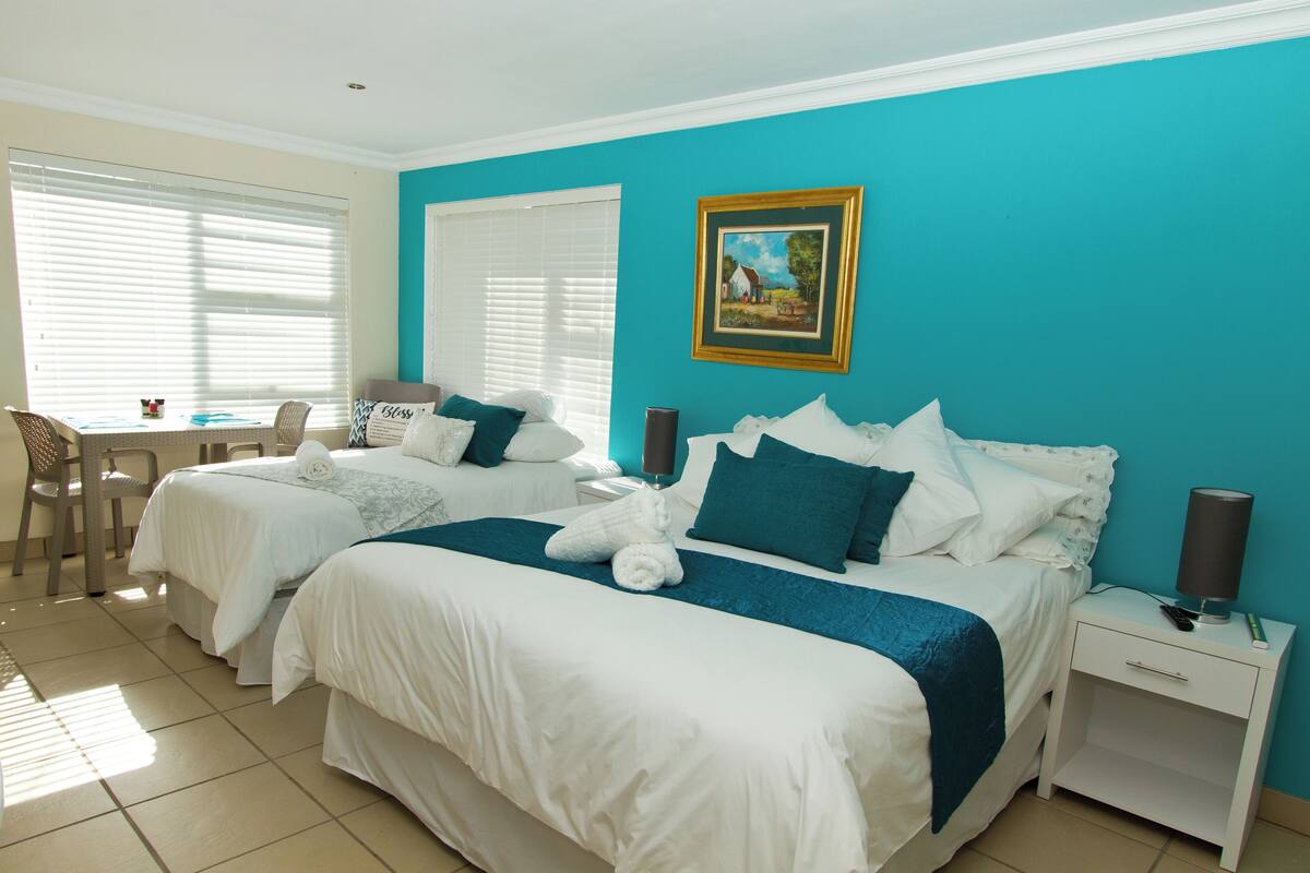 Family Triple Room, Garden View | Premium bedding, down comforters, pillowtop beds, desk