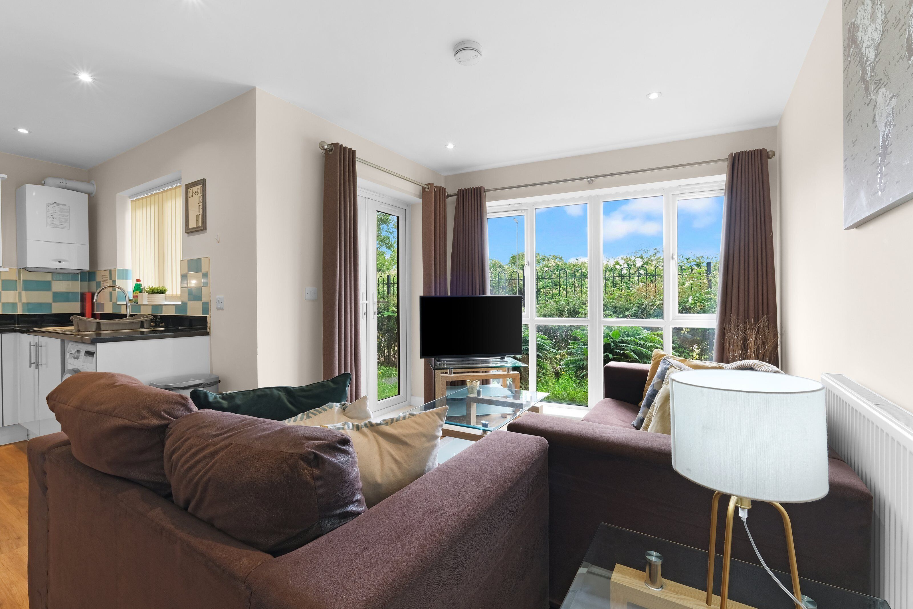Family Apartment, Balcony | Living area | 42-inch Smart TV with digital channels, Netflix, streaming services
