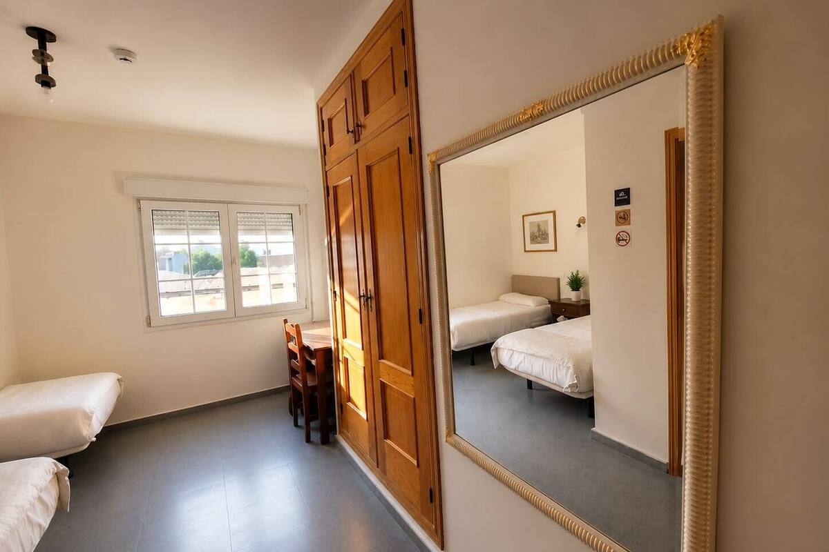 Classic Twin Room, Courtyard View | Desk, laptop workspace, WiFi (free), bed sheets