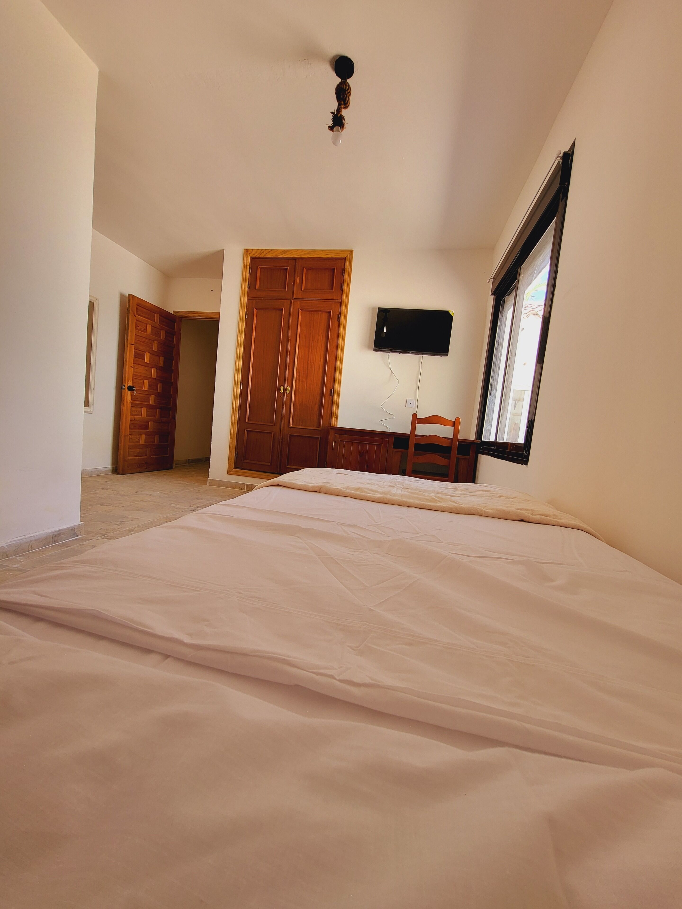 Habitación individual estándar, vista al patio | Escritorio, espacio para trabajar con laptop y wifi gratis 