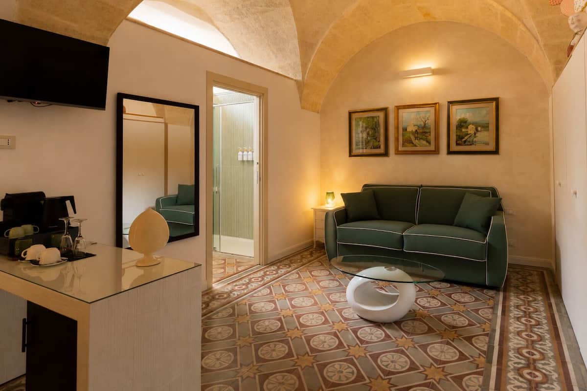 Junior Quadruple Room, Patio, Garden View | In-room safe, blackout drapes, soundproofing, WiFi (free)