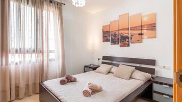 2 dormitorios, tabla de planchar con plancha, wifi y ropa de cama