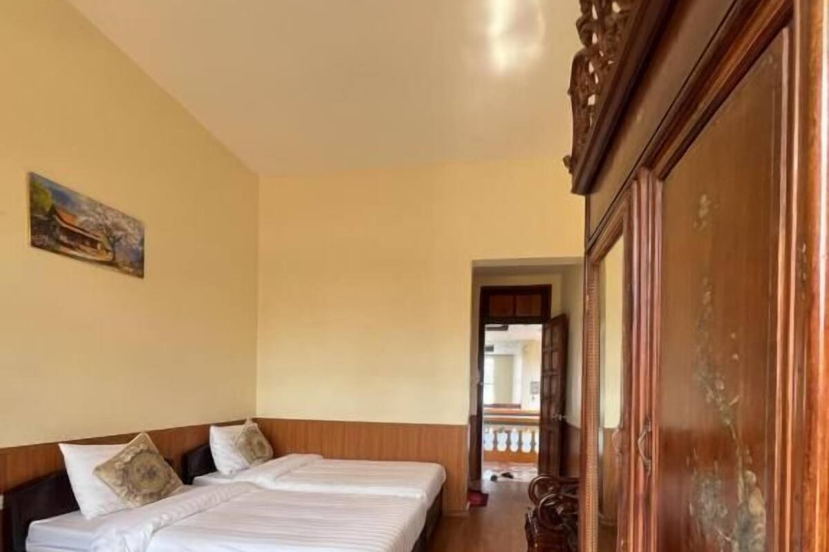 Habitación triple Deluxe, balcón, vistas al jardín | Sistema de insonorización y wifi gratis