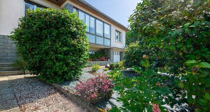 Chambre d’hôtes « Les Camélias » avec terrasse partagée et jardin privé