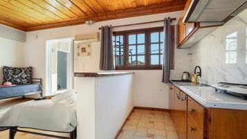 Fridge, stovetop, electric kettle, toaster