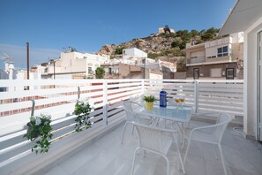 Outdoor dining - Holiday Home 'Mirador De San Juan De Las Aguilas' with Mountain View, Wi-Fi and Air Conditioning (Aguilas)