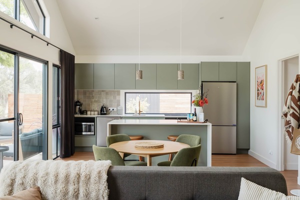 The open plan living area offers the perfect space to unwind after a day of exploring