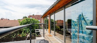 Gastenkamer 'La Passerelle' met balkon, wifi en airconditioning