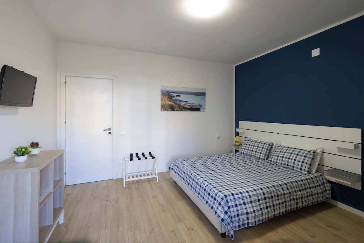 Family Double Room, Garden View | Blackout curtains, soundproofing, iron/ironing board (on request)