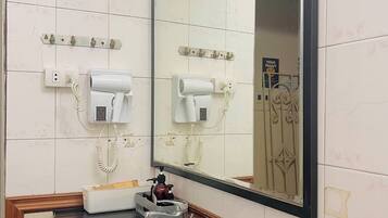 Shower, free toiletries, hair dryer, slippers