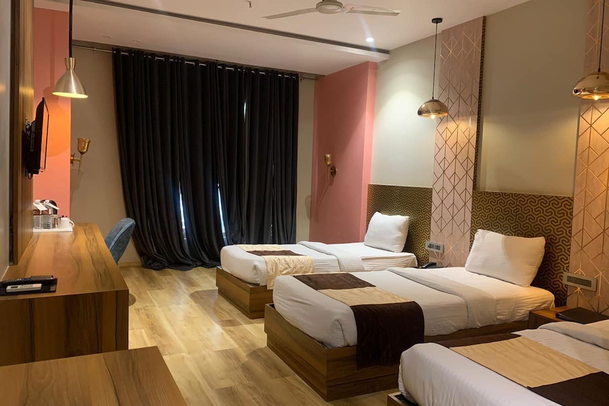 Deluxe Room, Non Smoking, City View | Premium bedding, desk, laptop workspace, blackout drapes