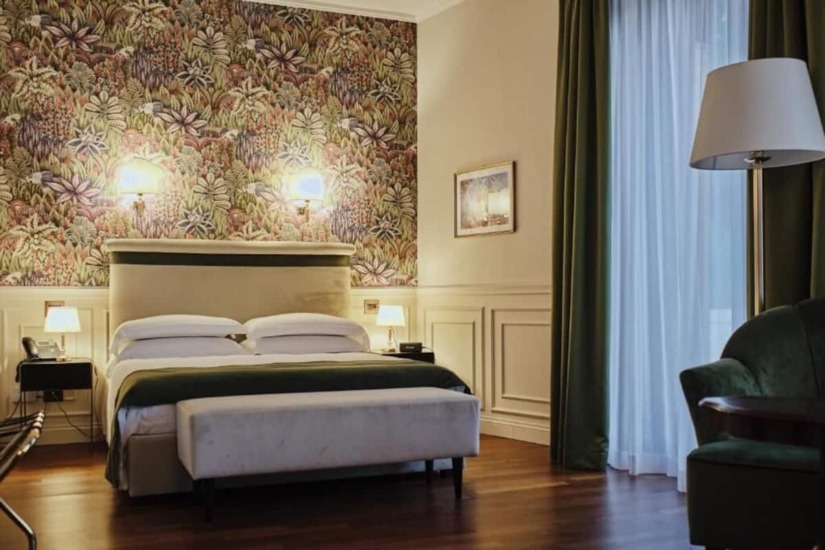 Suite júnior, vistes al jardí | Caixa forta a l'habitació i wifi gratuïta 