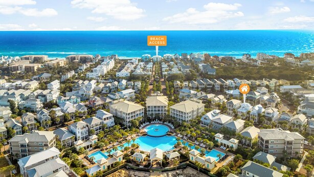 A coastal residential area with a large pool, beachfront access, and a clear view of the ocean. - NEW LISTING - Completely remodeled with new pics coming soon. (Seacrest Beach)