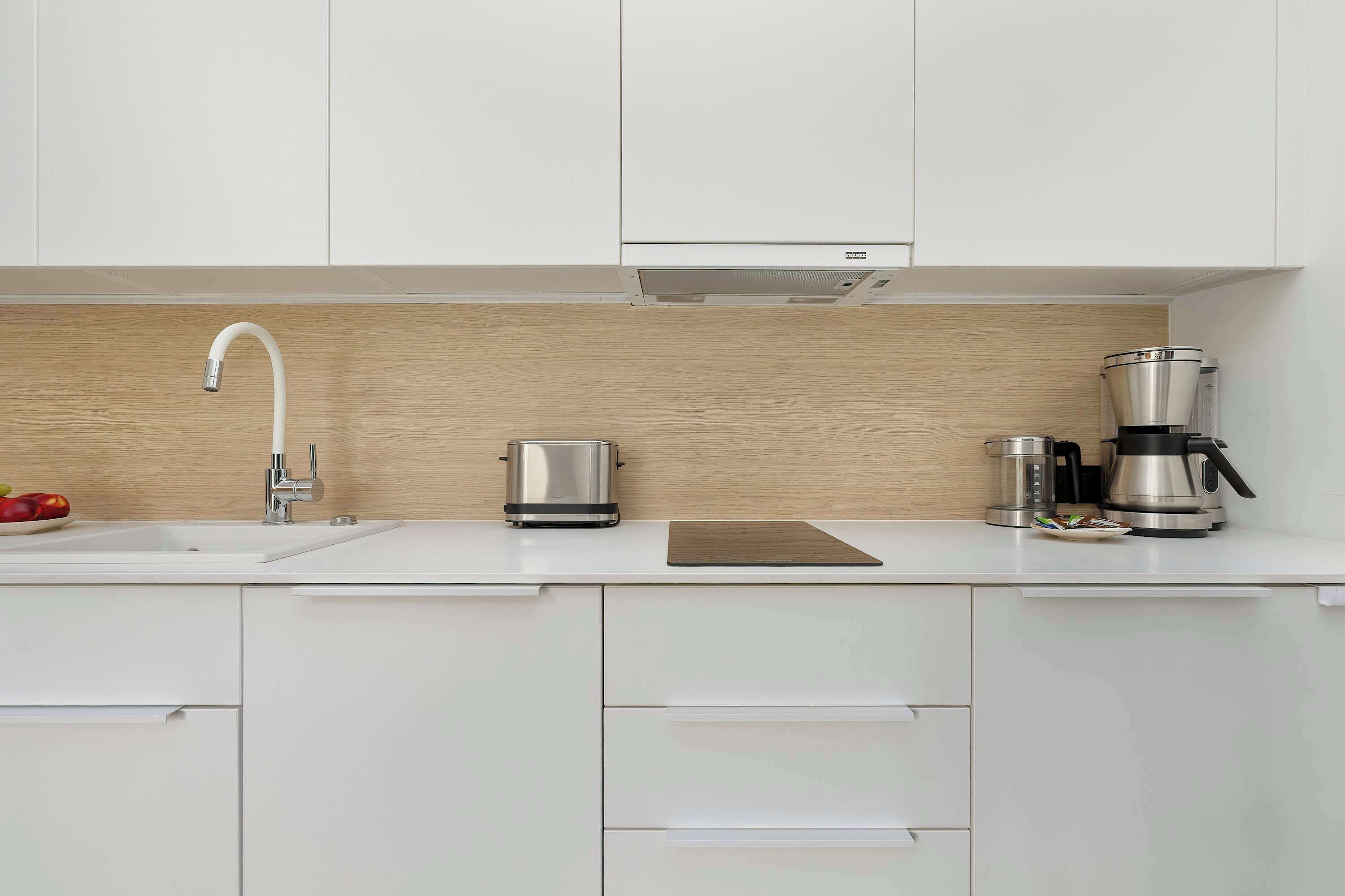 Fridge, stovetop, dishwasher, coffee/tea maker