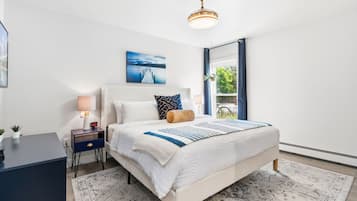Apartment, 1 King Bed with Sofa bed, Garden View (Coastal Comfort) | 1 bedroom, individually decorated, individually furnished