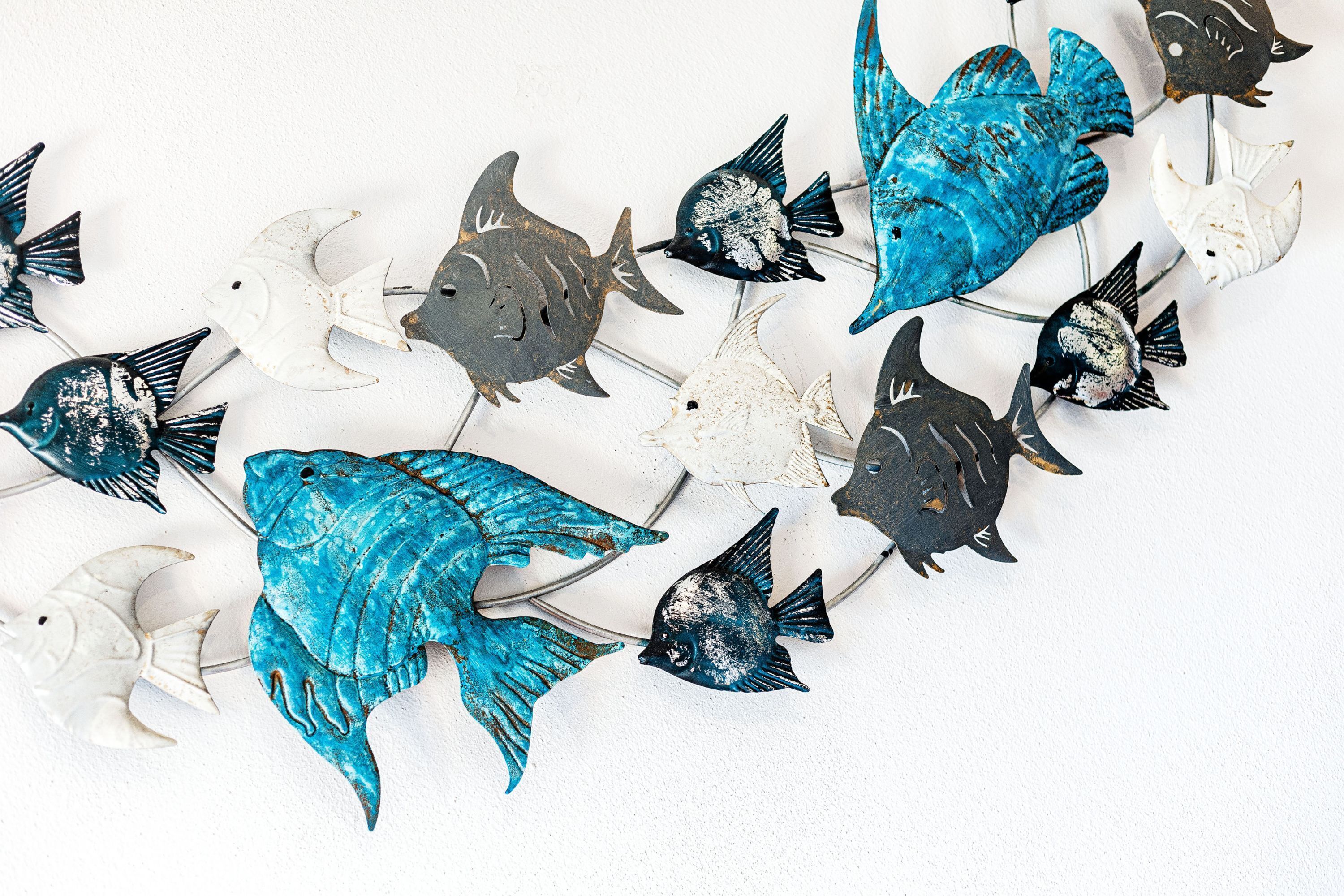 A collection of fish-shaped wall decorations.