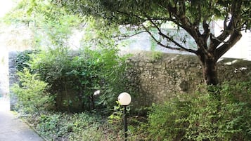 Deluxe Triple Room, Courtyard View | Property grounds