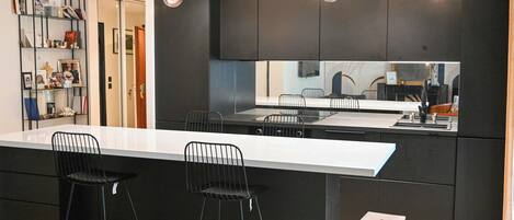 Coffee/tea maker, fridge, microwave, oven