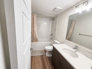 Bathroom - 2-bedroom basement apartment with self check-in in welcoming YYC neighborhood (Calgary)