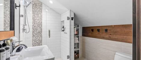 Loft bathroom with walk in shower